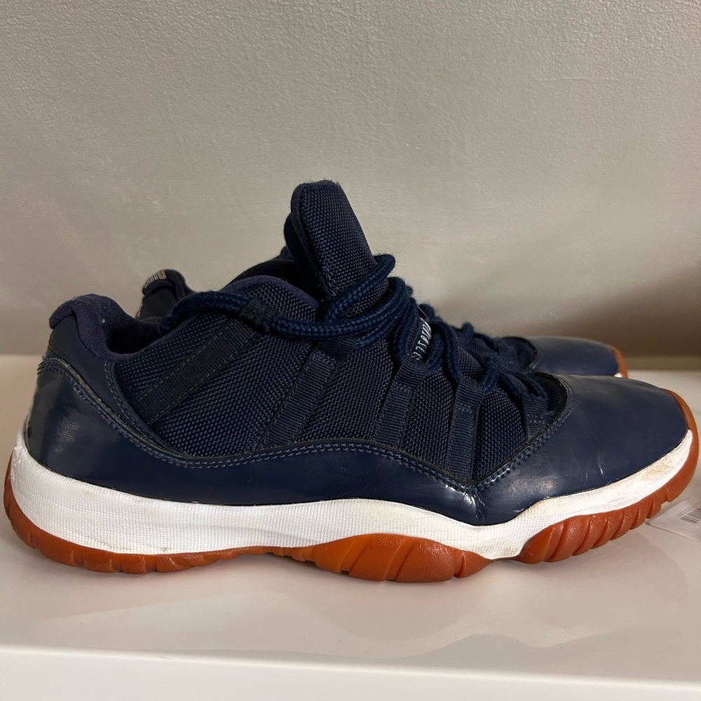 Nike Air Jordan 11 navy blue gum sneakers